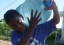 Picture of child holding water bottle.